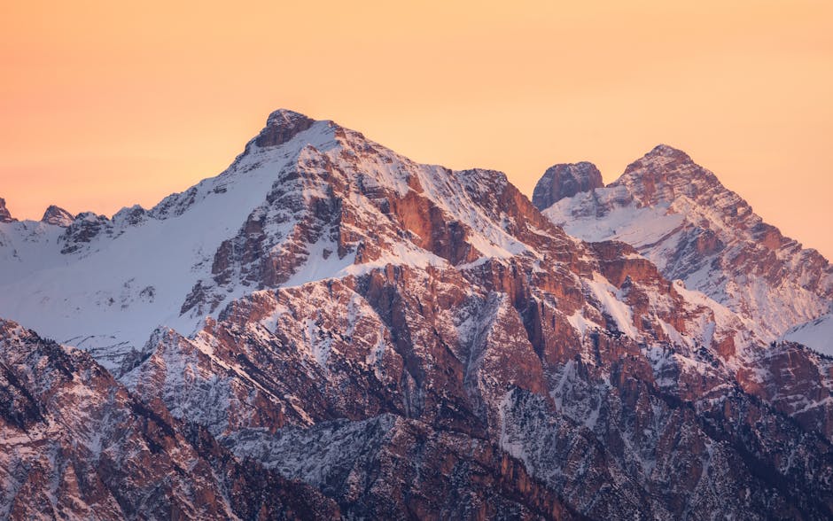 couple hiking alpine trail sunrise Dolomites