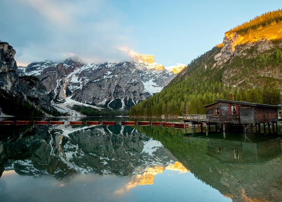 Lago di Braies sunrise reflection calm