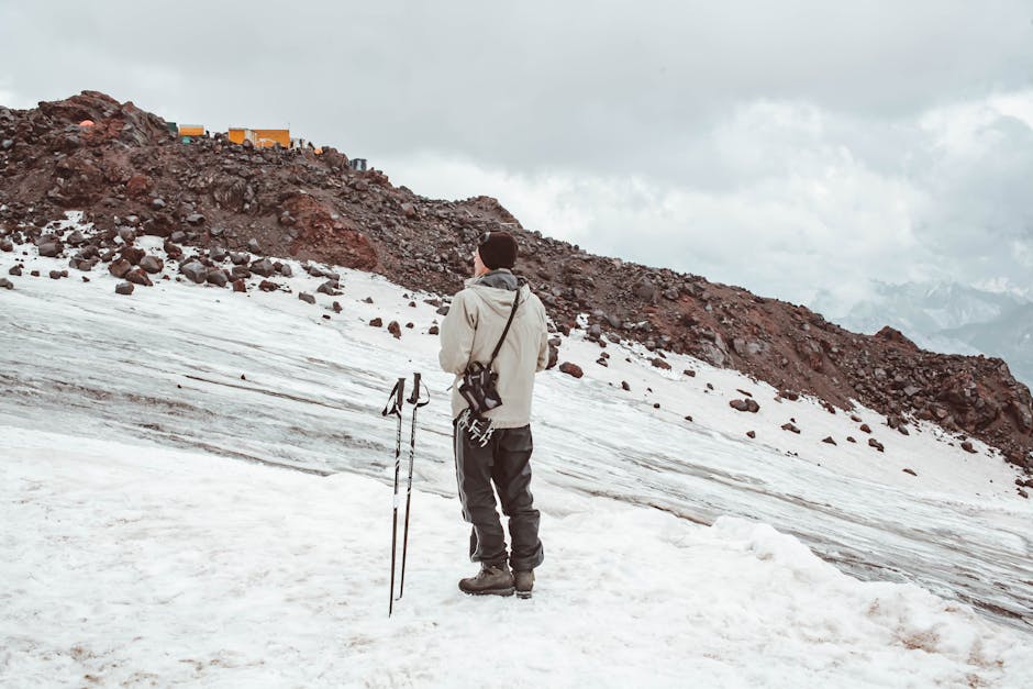 Hiker using trekking poles Dolomites ridge