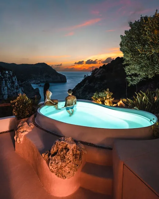 Couple dans un bain extérieur lumineux avec vue sur la mer